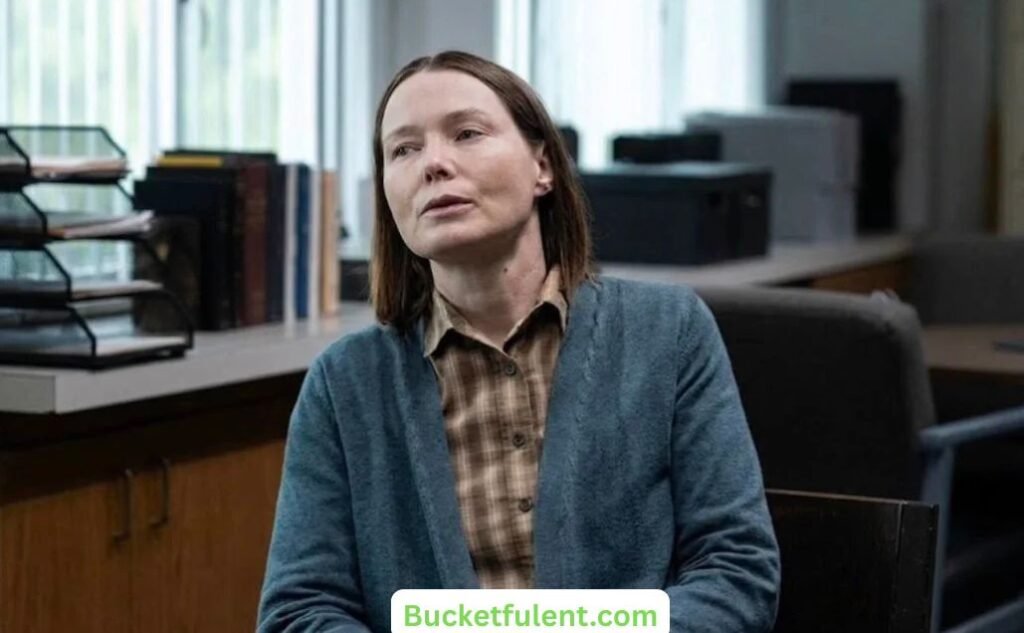 Margaret White sitting in Ewen High School offce, she looks upset, in carrie 2026 tv series. 